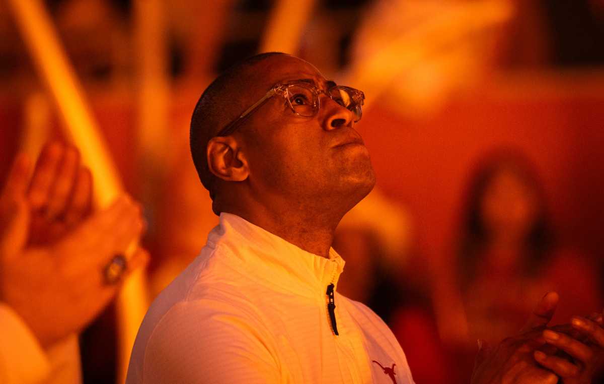 Texas Head Coach Rodney Terry watches the pre-game video ahead of the Longhorns' game against the Baylor Bears at the Moody Center in Austin, Jan 20, 2024.  